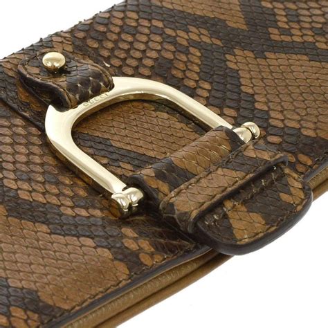 Gucci snakeskin clutch